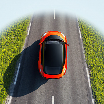 Vibrant Solitude Aerial View of a Sleek Car on a Scenic Road